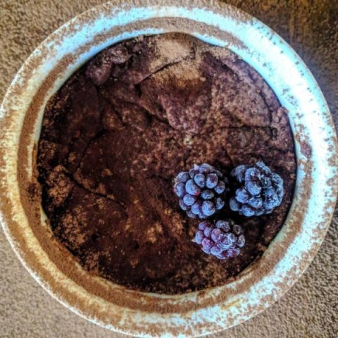 Overhead view of personal brownie in ramekin