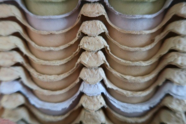 Egg cartons stacked - side view