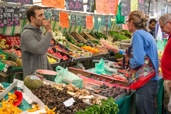 Farmer selling produce in farmer's market