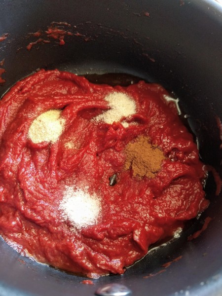 Tomato paste with spices in pot - step 2 for sugar free ketchup recipe