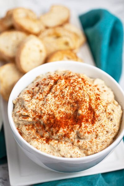 Eggplant baba ghanoush in a white bowl 