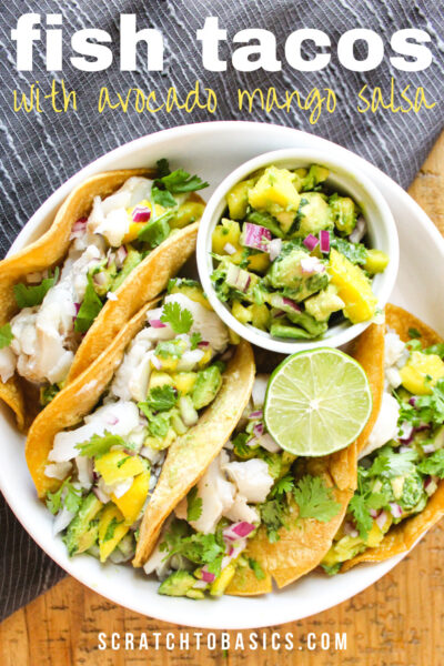 overhead view of fish tacos with avocado mango salsa