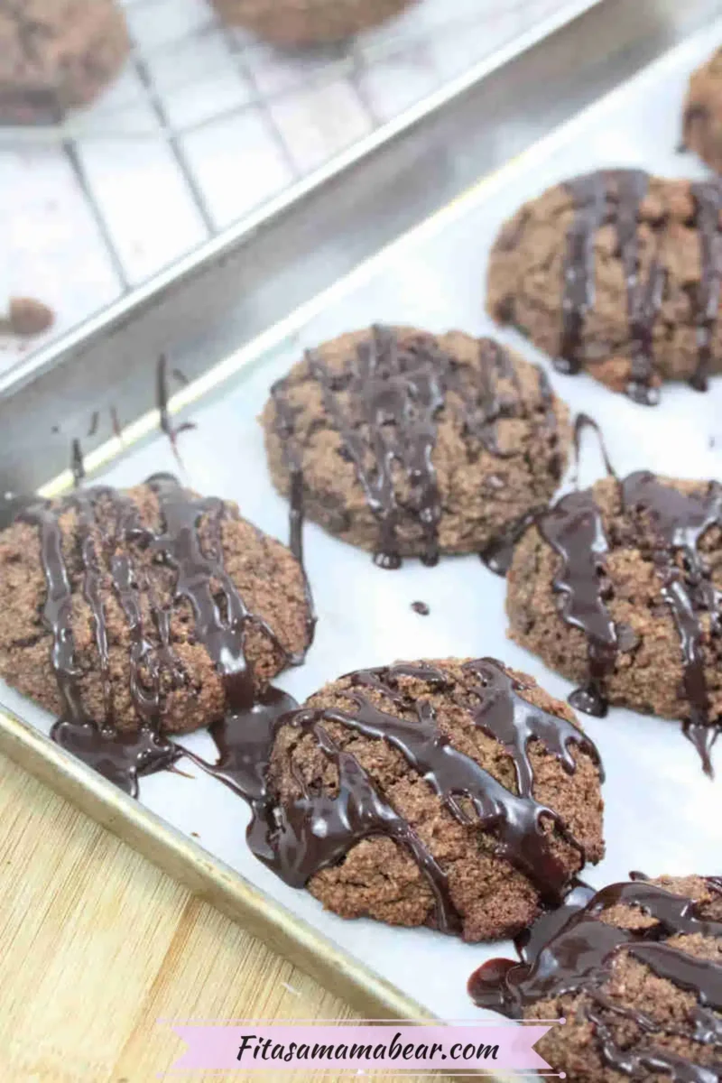 cookies with chocolate glaze on a baking pan