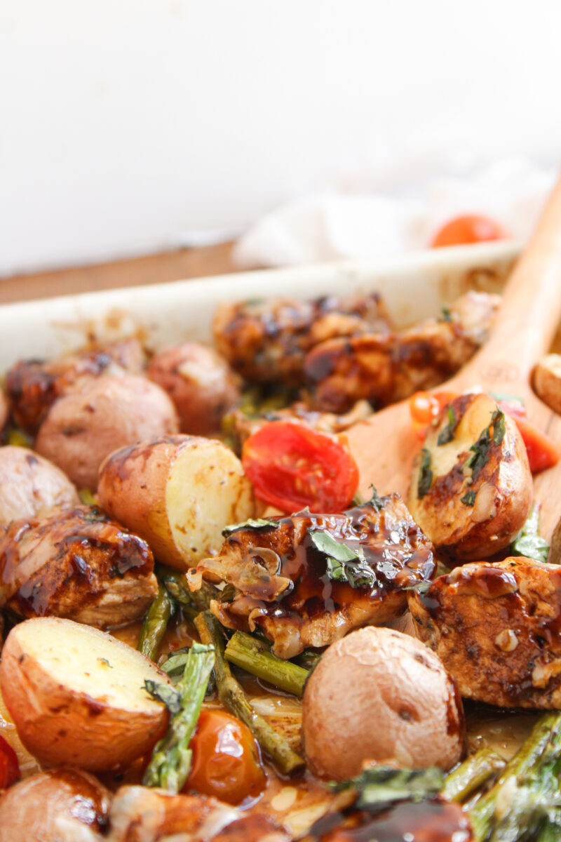 Close up of potatoes, chicken, and veggies.