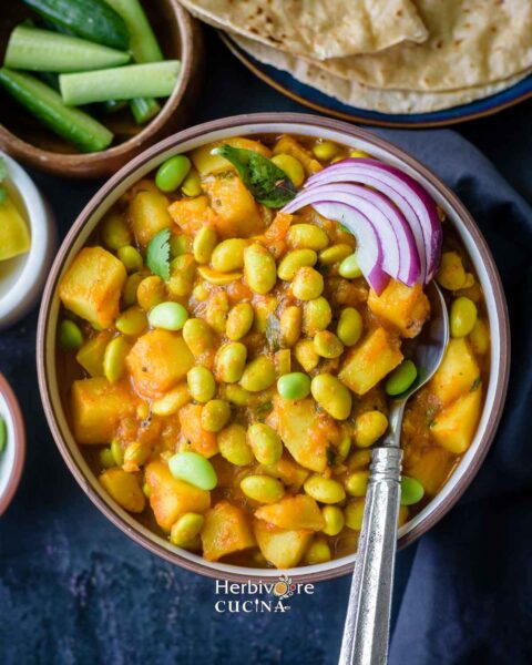 cooked potato edamame curry in a bowl