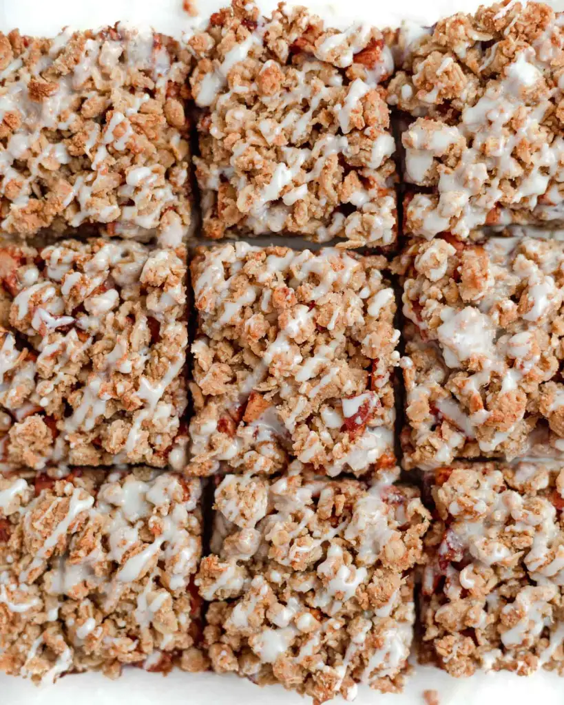 baked apple pie bars with  whote vanilla glaze