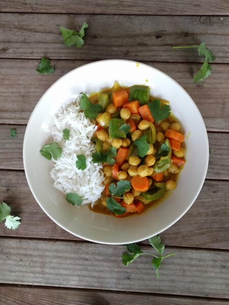 coconut curry with rice in bowl