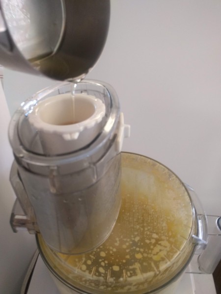 food processor with the pusher that the oil drips into the mayonnaise with.
