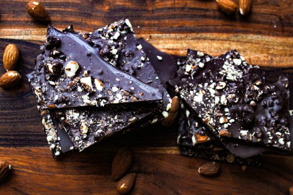 dark chocolate almond bark on table