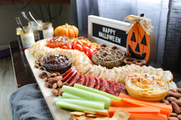 Halloween snack board made with Secolari products and pumpkin hummus