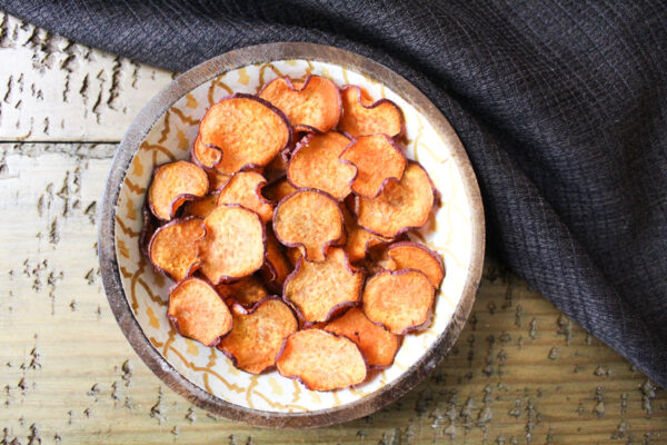 dehydrated vegetable chips in bowl  - sweet potatoes