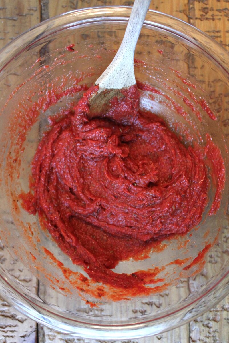 tomato paste, herbs, salt, oil, and vinegar mixed into thick pizza sauce
