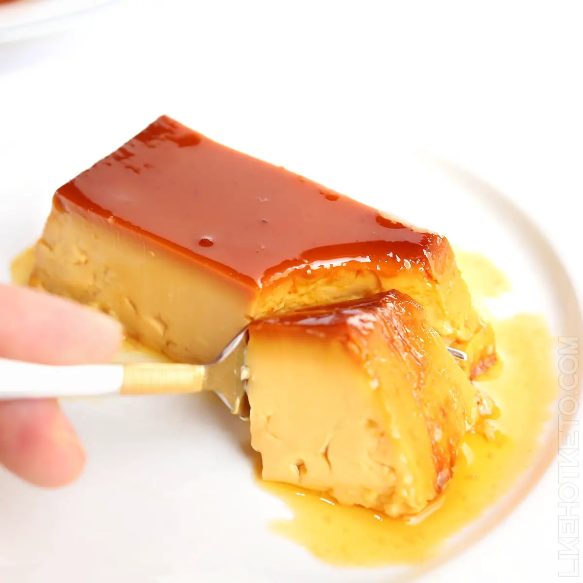 caramel flan with a spoon