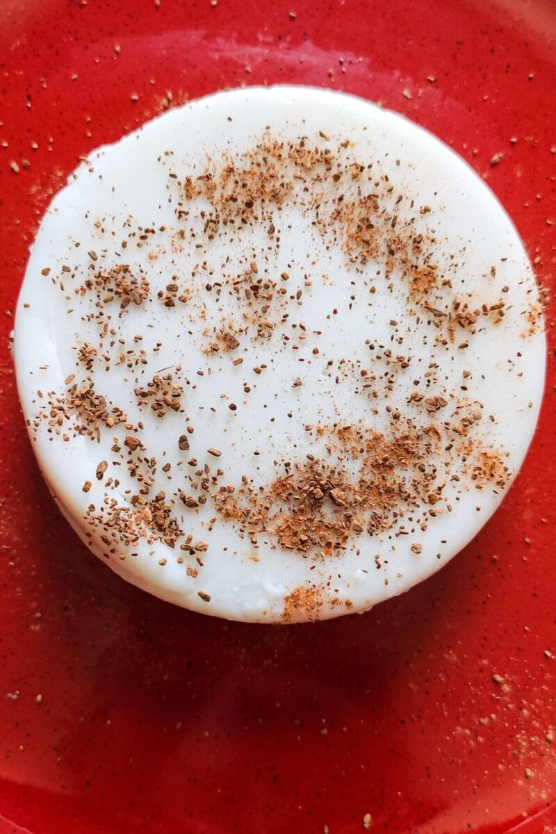 coconut pudding topped with cinnamon powder