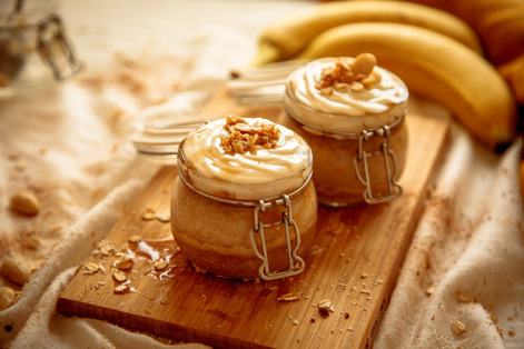 banana mouse  with cream cheese topped with nuts