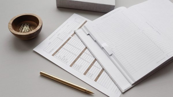 Track your food spending on a notebook or a budget template