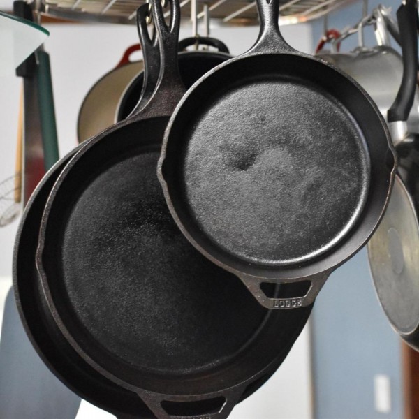 cast irons hanging in kitchen