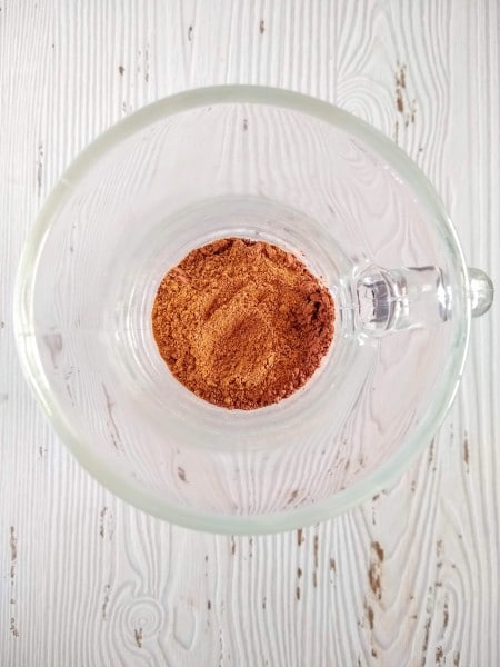 Chai spice blend scooped in mug