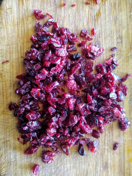 Cranberries on cutting board