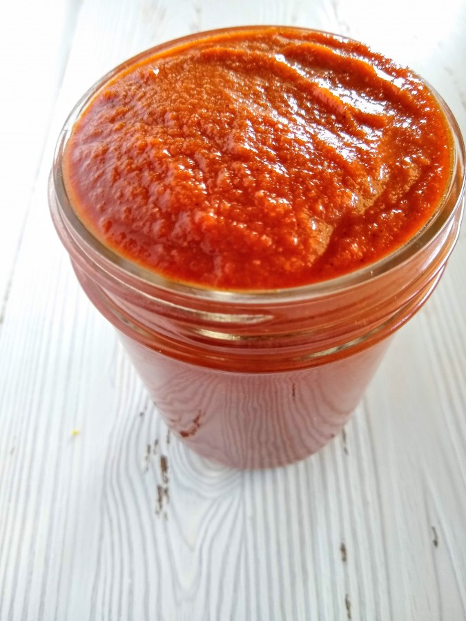 Finished red enchilada sauce in mason jar