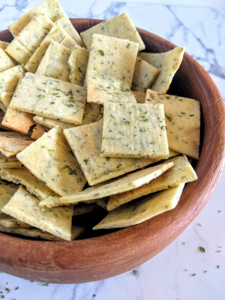 Bowl of delicious homemade almond flour ranch crackers.