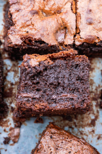 slices of gluten free bownies on a white baking sheet