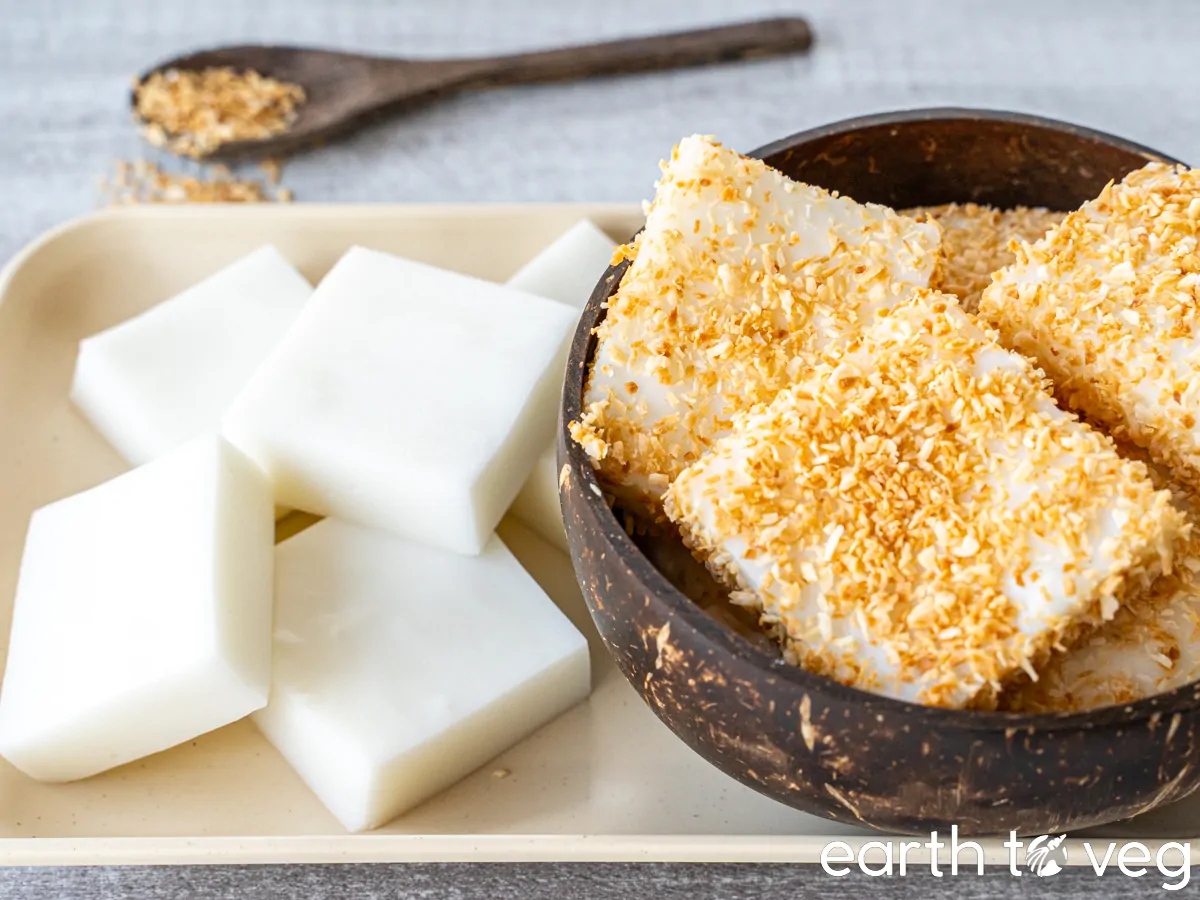 coconut pudding sliced into squares in a bowl  (coated with toasted coconut shavings) and on a plate (plain)