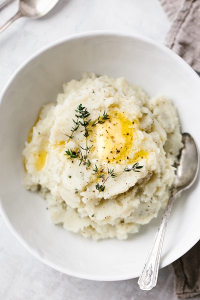 Mashed cauliflower with garlic and herbs by Downshiftology