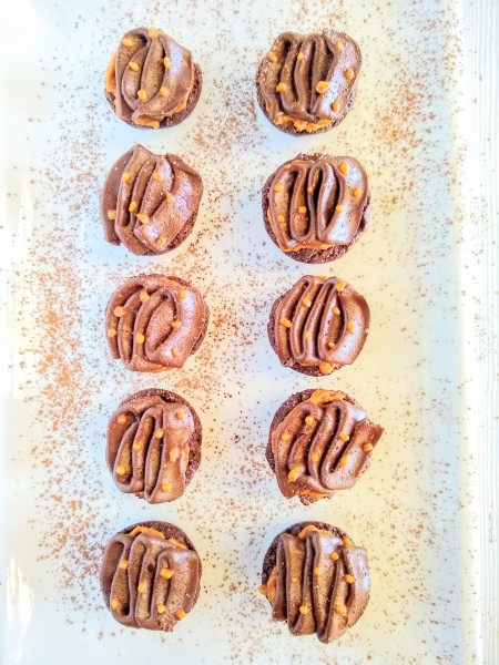 A delicious pumpkin chocolate dessert. Perfect brownie bite size for a party.