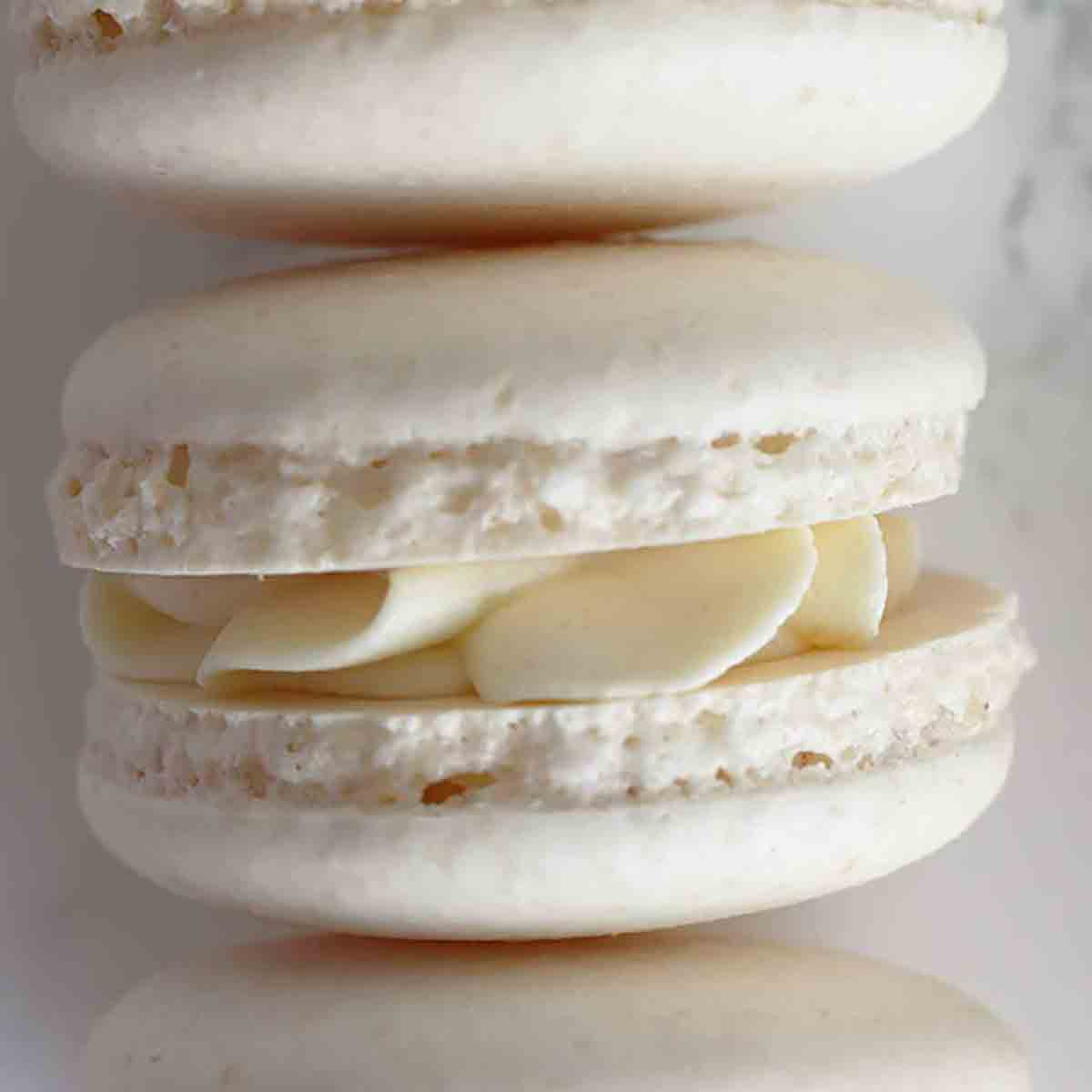 close shot of white French vegan macaron