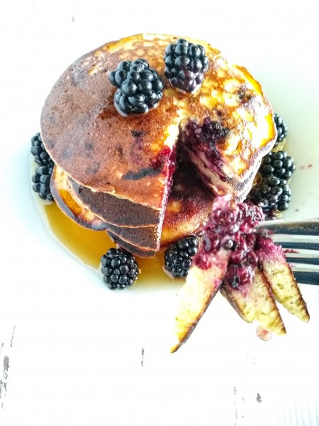 Take a bite of these delicious paleo pancakes stuffed with berries and nutrients.