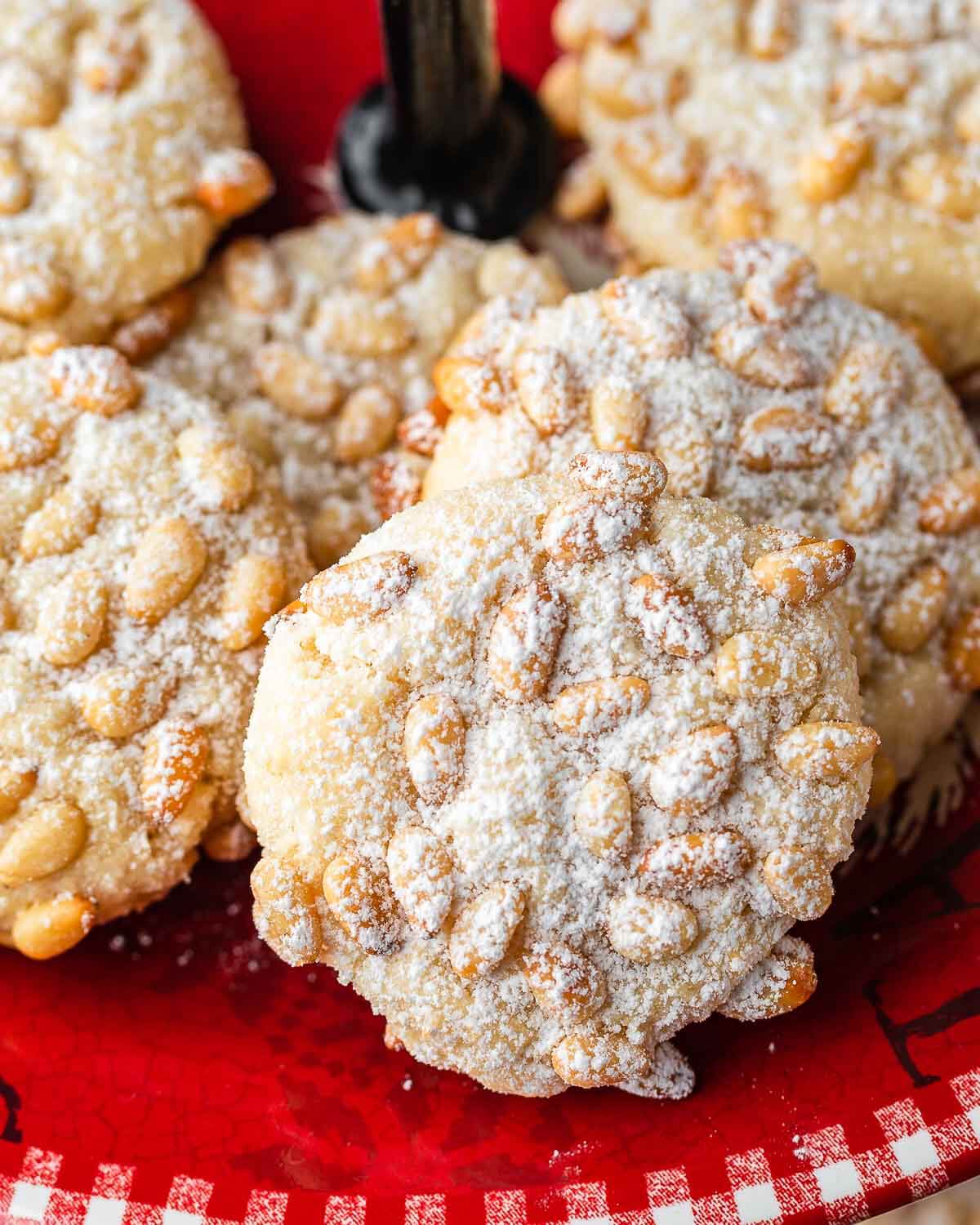 pignoli cookies with nuts and confectioners's sugar