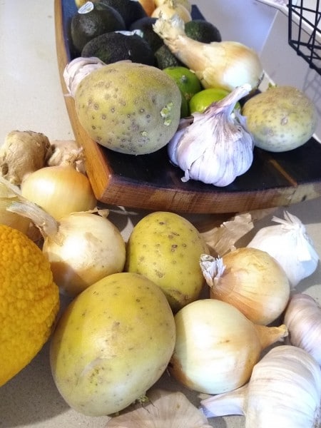 Before we bought produce holding baskets, our produce was cluttering the counter.