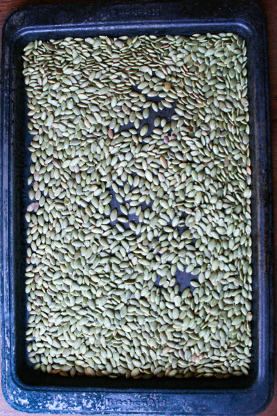 roasted pumpkin seeds on an oven pan 