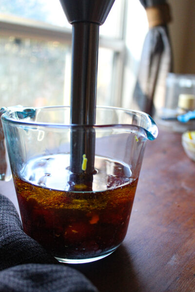ingredients for raspberry vinaigrette - 1 cup fresh raspberries, ½ cup olive oil, ¼ cup red wine vinegar, ½ tsp mustard, ¼ tsp salt and Black Pepper in an immersion blender