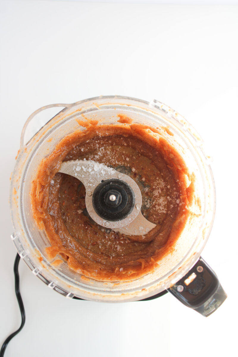 Salt added to ingredients in food processor.