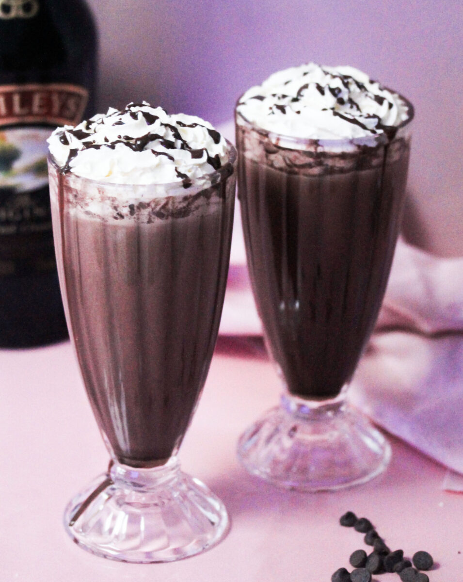 bailey's hot choco in cups with cream and drizzled with choco syrup