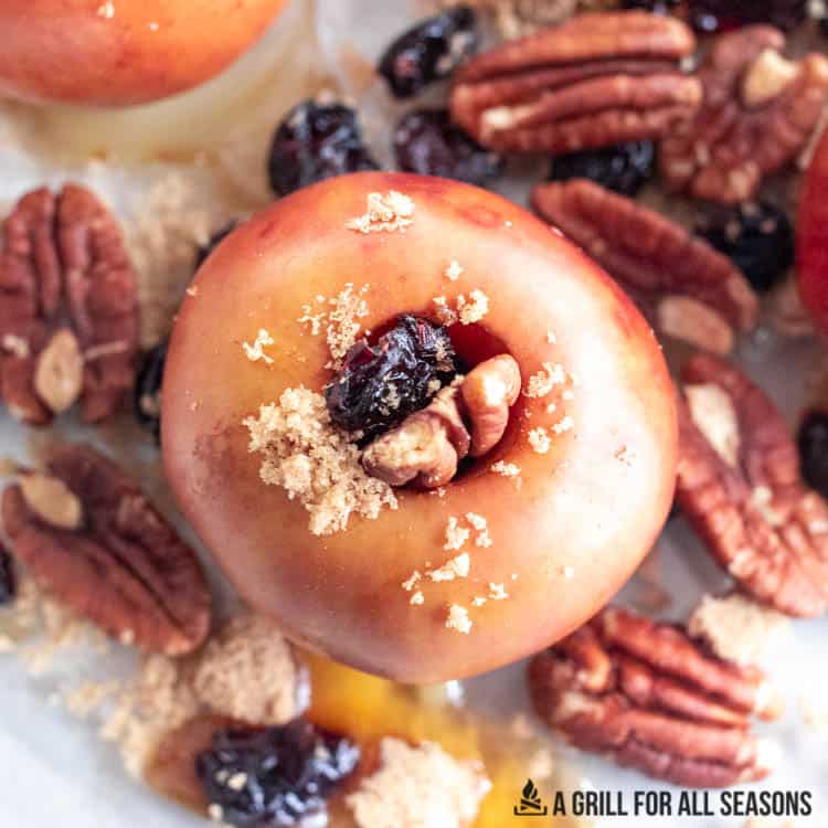 smoked apple with nuts and dried fruits