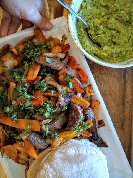 Steak fajitas with guacamole