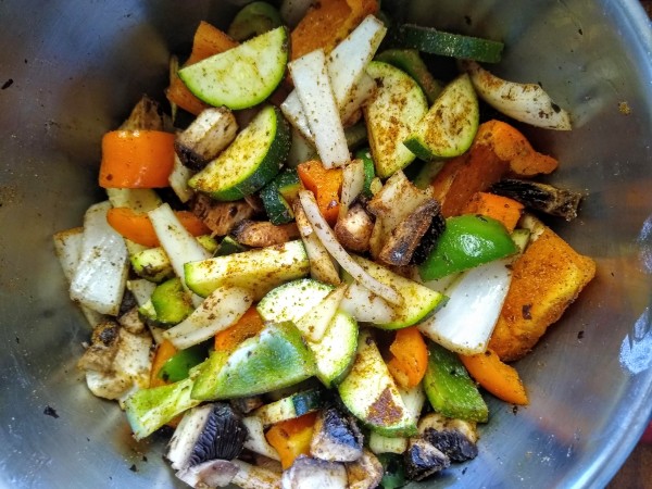 Toss the veggies in the oil and seasoning