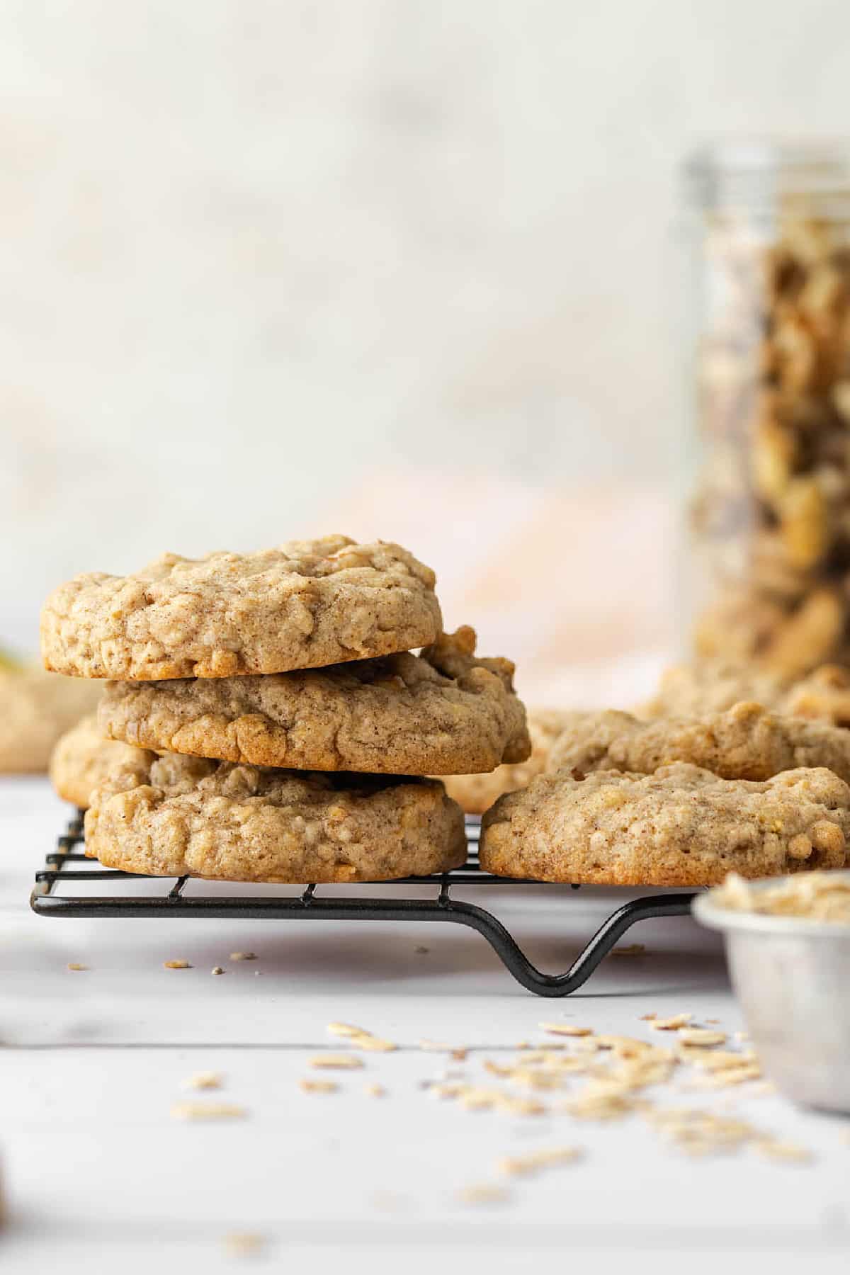 stacked oatmeal cookies on a wire rack