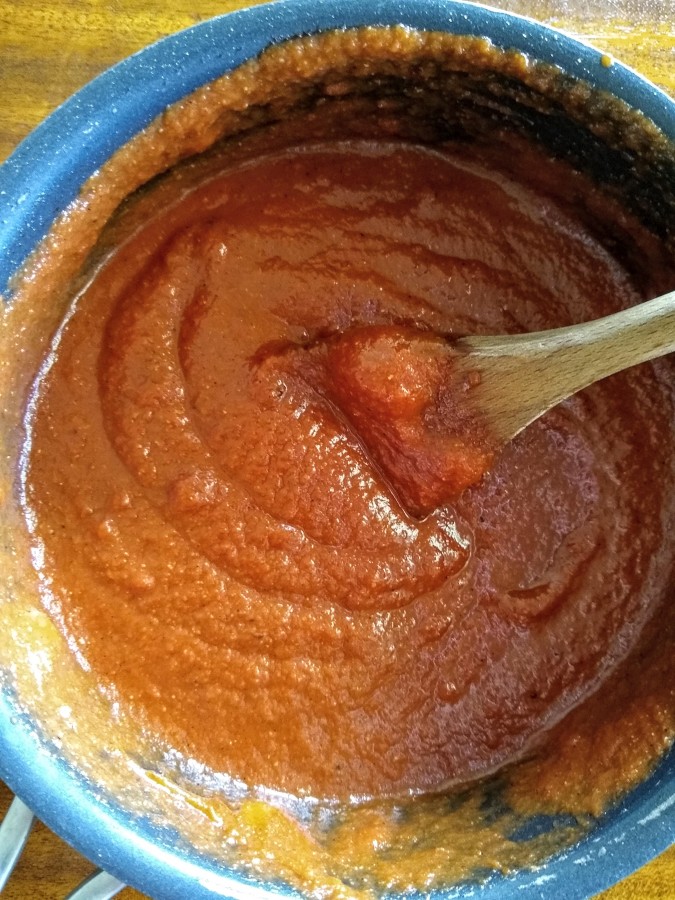 Water added to enchilada sauce in pan